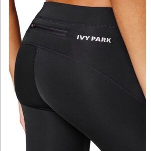 Ivy Park Black Cropped Workout Leggings. Size Large.